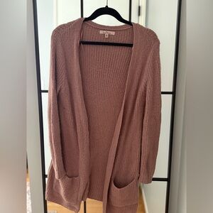 Oversized blush pink cardigan with two baggy pockets